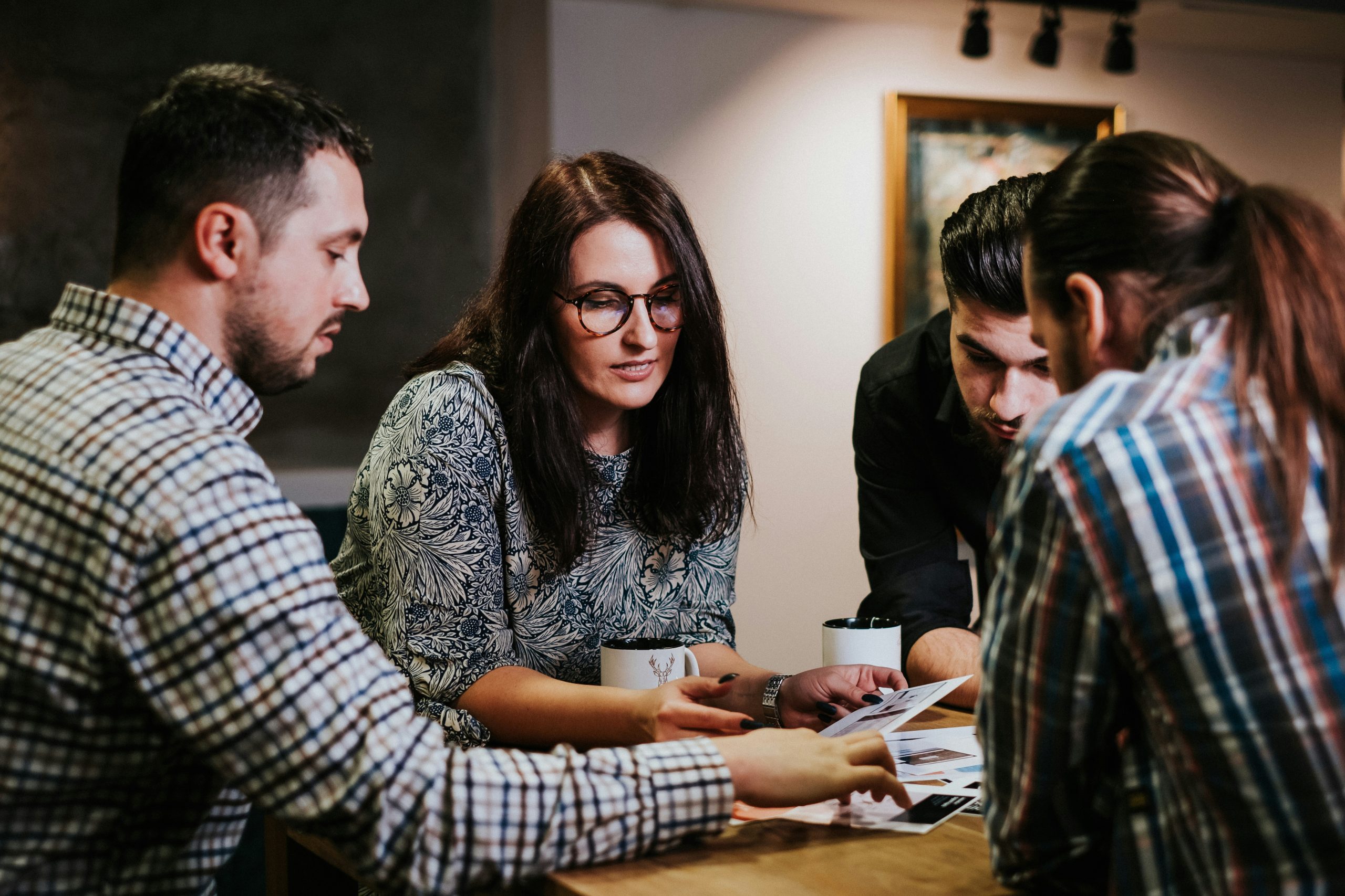Business professionals learning Mandarin in a corporate training session in Auckland